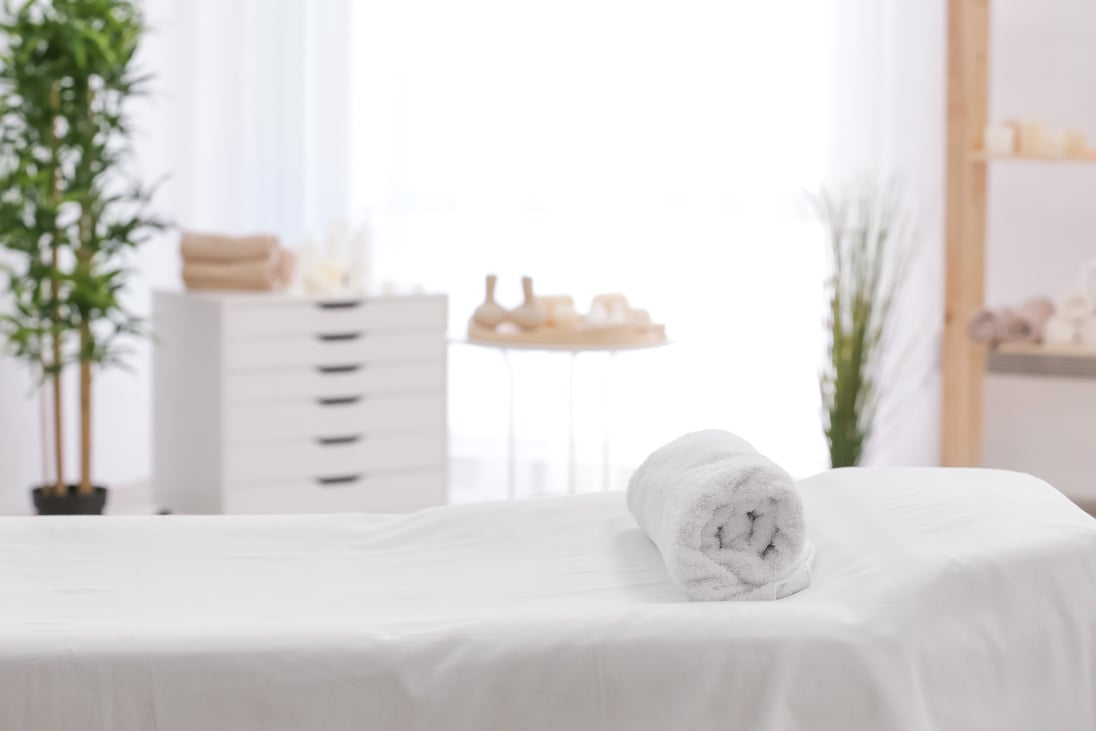 Towel on Massage Table in Modern Spa Salon